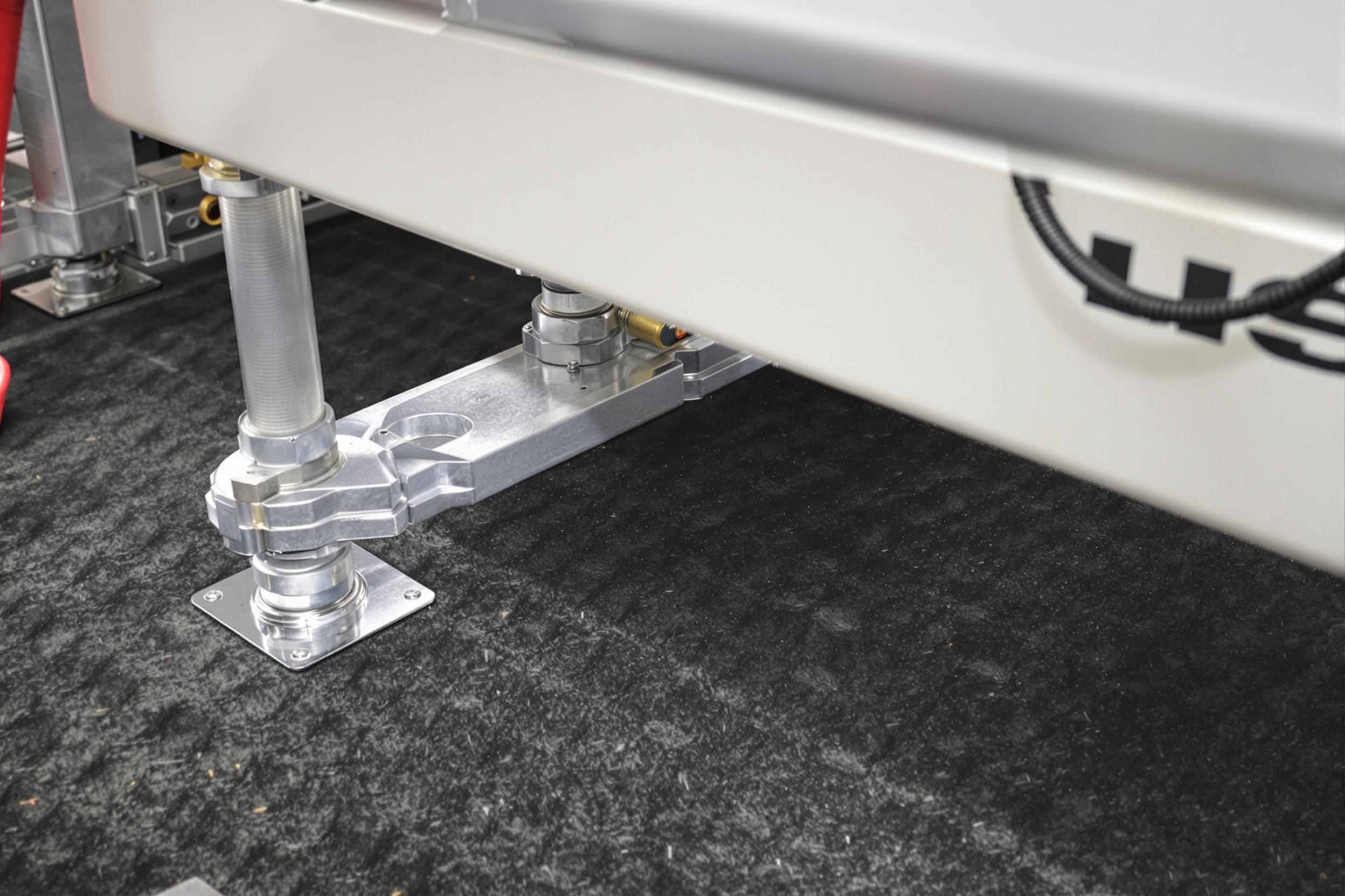 Tapis en caoutchouc sous machine